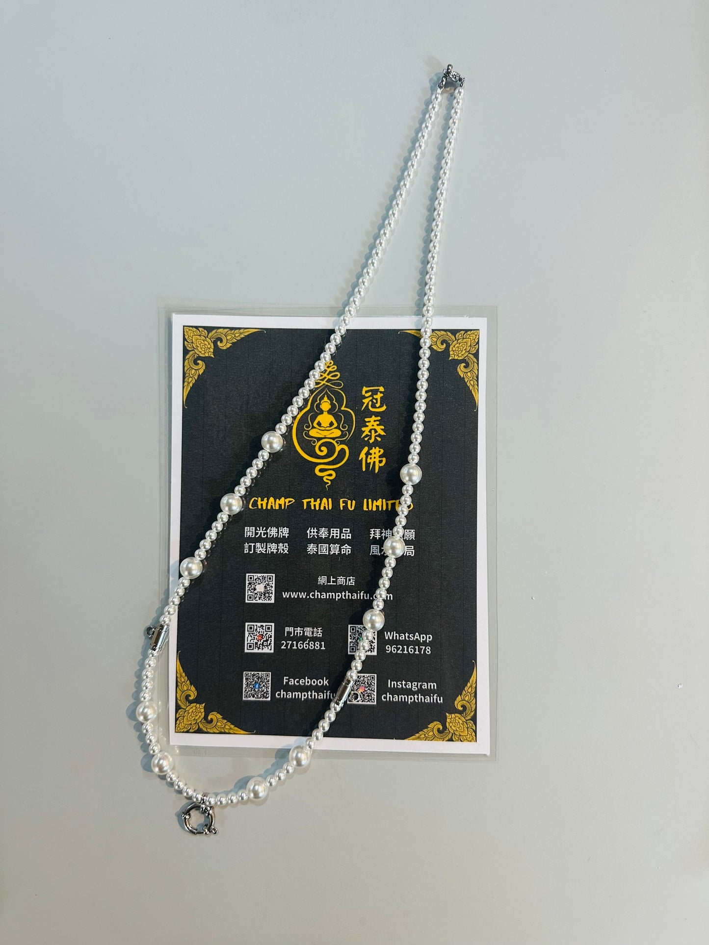 Three-strand pearl necklace
