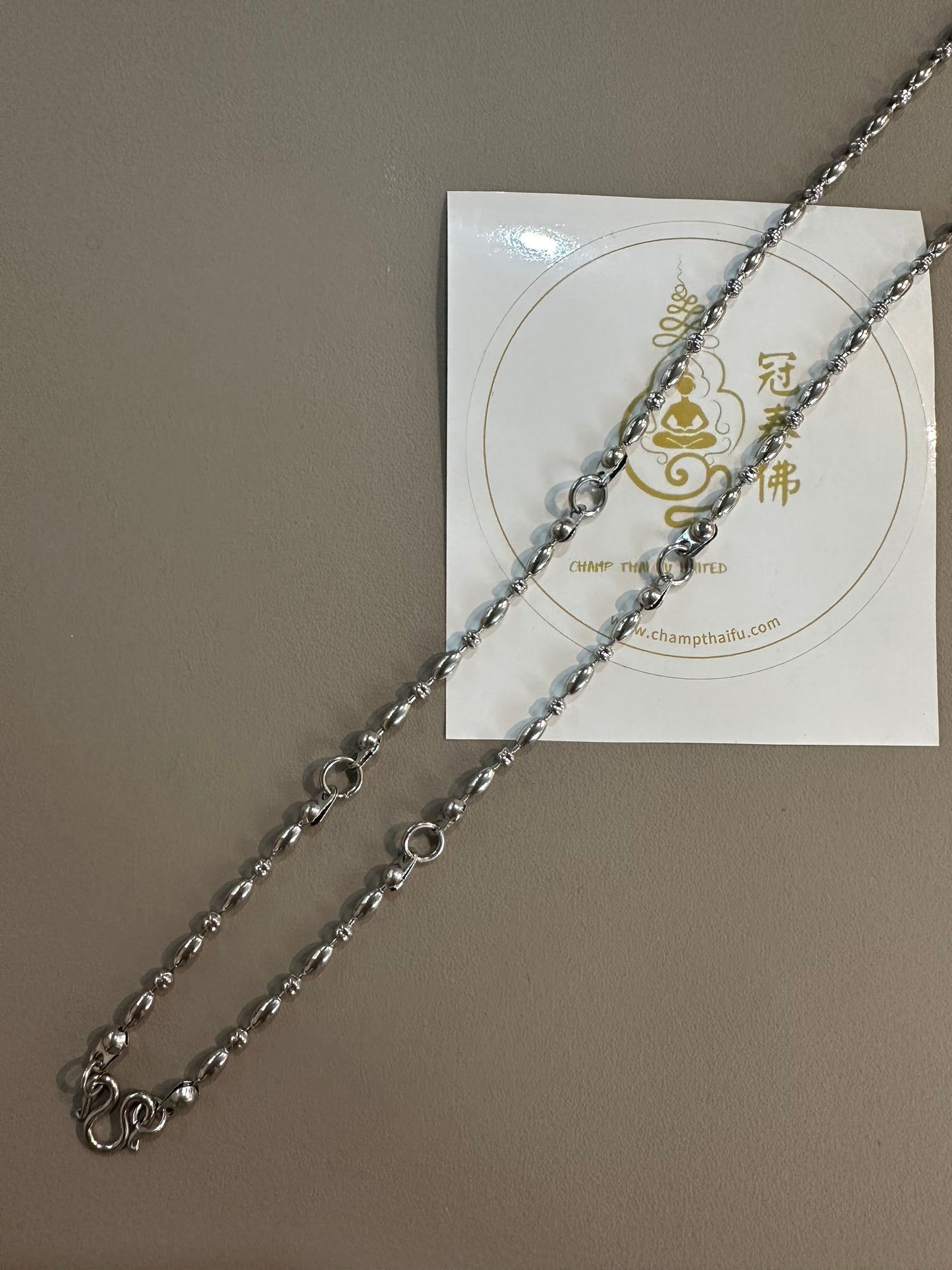 Five-piece stainless steel olive bead design